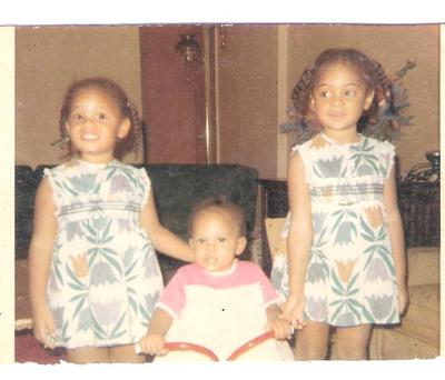 Sister # 3's First Birthday (from left): Sister #2, the Birthday Girl, and Me